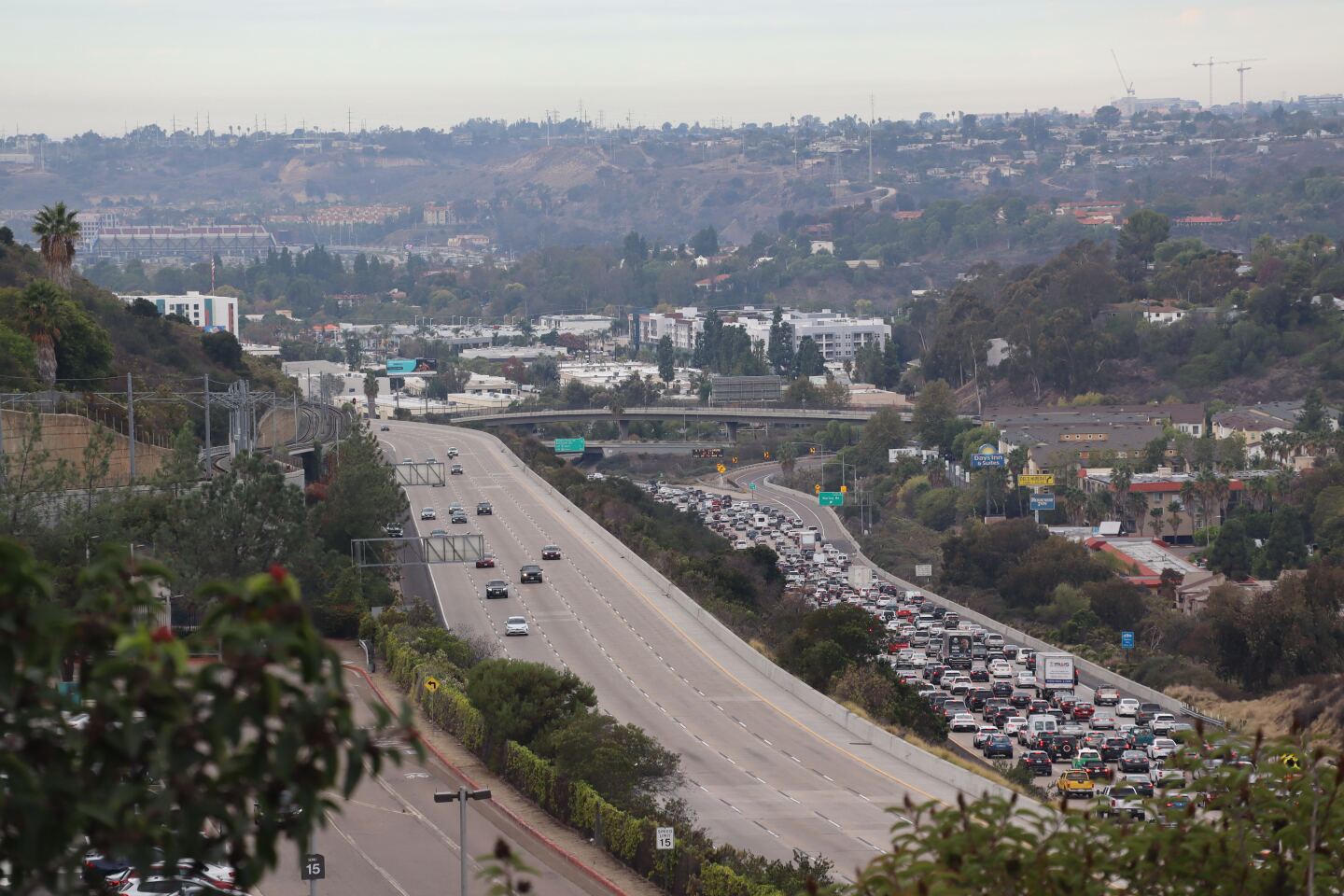 Cars are gridlocked on Interstate 8 after a collision that involved the death of a police officer in La Mesa on Oct. 21, 2025.