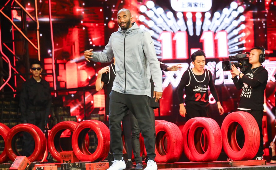 Former Los Angeles Laker Kobe Bryant performs during the 2016 Tmall 11.11 Global Shopping Festival gala in Shenzhen in south China's Guangdong province.