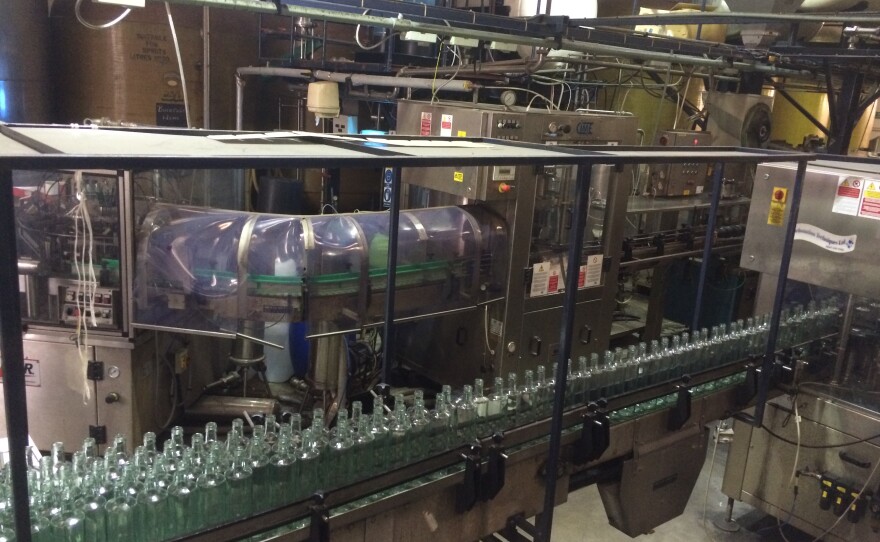 Bottles lined up at the Thames Distillery in London, waiting to be filled.