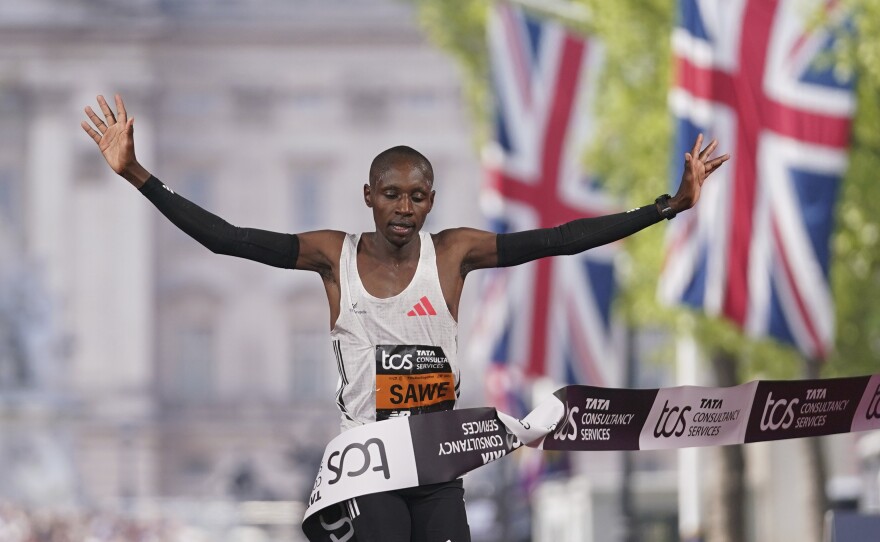 Sabastian Sawe of Kenya crosses the line to win the men's race at the London Marathon, April 27, 2025