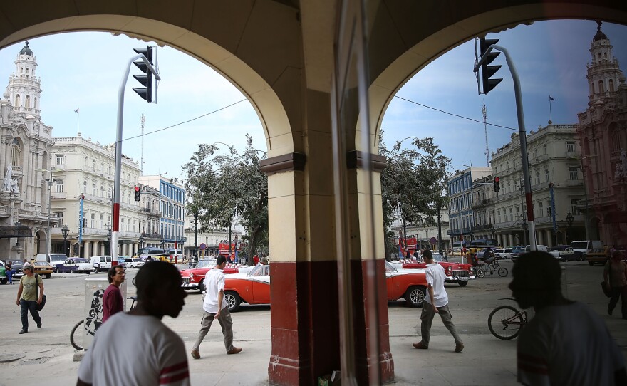 People walk through the streets as Cuba prepares for the visit of President Obama on March 18 in Havana.