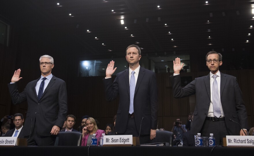 Colin Stretch (left), general counsel of Facebook; Sean Edgett (center), acting general counsel of Twitter; and Richard Salgado, director of law enforcement and information security of Google, are sworn in prior to testifying during a U.S. Senate Judiciary subcommittee hearing on Russian influence on social networks on Capitol Hill on Tuesday.