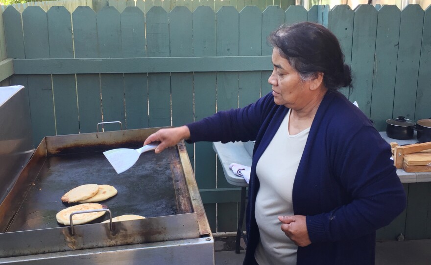 Maria Contreras, José's sister, makes papusas and other food for sale in Southern California — to help support the family while José is in detention at the ICE Adelanto Processing Center. He has been held there for months without his glasses or requested counseling for depression, she says, and doesn't get his diabetes medication when he needs it.