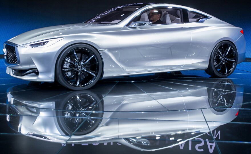 The Infiniti Q60 concept car is unveiled at the auto show.