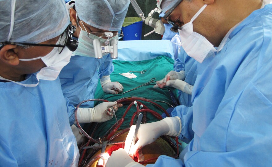 Dr. Devi Shetty operates on a young man, one of the 14,000 patients who underwent surgery at Narayana Health last year. 58 surgeons work six days a week performing surgery at the Bangalore center. Shetty's group has grown to 29 hospitals around India.