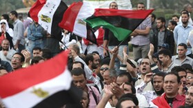 Egyptians attend a rally calling for a rapid transition from military to civilian rule in following the February ouster of president Hosni Mubarak in Cairo's Tahrir Square.