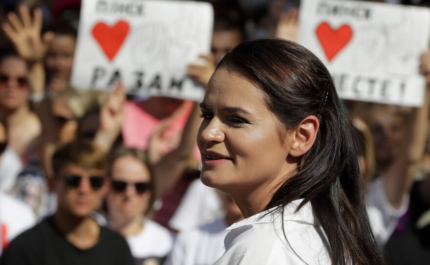 Svetlana Tikhanovskaya, candidate for Belarus' presidential election, smiles as she speaks to people during a meeting in her support in Brest, Belarus, on Aug. 2.