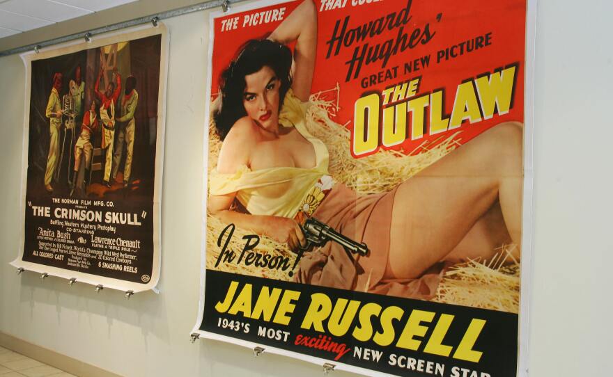 An original poster from the 1943 movie <em>The Outlaw</em> staring Jane Russell is shown on display at a Los Angeles auction house in December 2006.