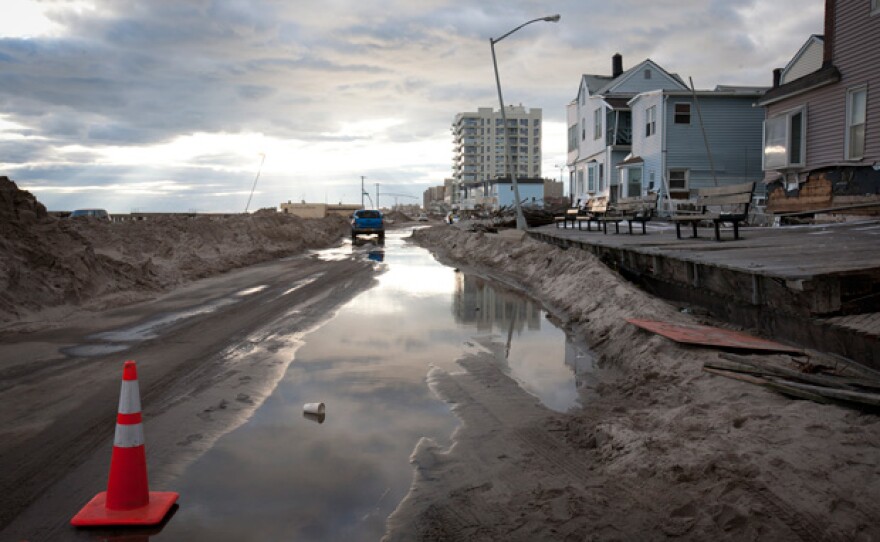 Water soaked roads filled with sand from beach in Rockaway Beach, Queens, an area affected by Hurricane Sandy on November 3, 2012.