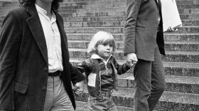 Zayd Ayers Dohrn walks with his parents Bill Ayers and Bernardine Dohrn outside the Federal Court Building in New York, May 17, 1982.
