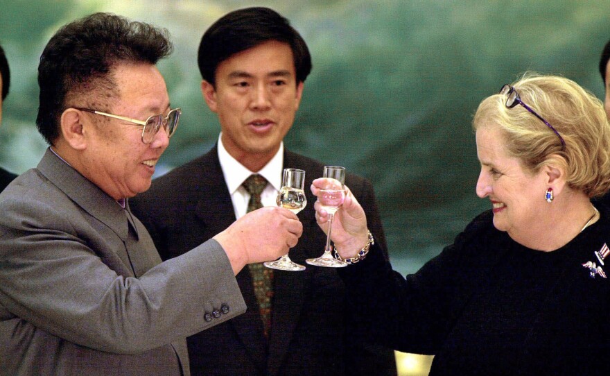 Then-Secretary of State Madeleine Albright and North Korean leader Kim Jong Il toast in Pyongyang on Oct. 24, 2000. The U.S. and North Korea signed an agreement six years earlier to curb North Korea's nuclear activities in exchange for aid, but it collapsed in 2002, during the Bush administration.