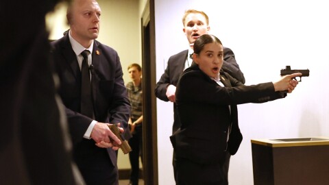 Secret service agents respond after shots were fired during the White House Correspondents' Dinner on Saturday.