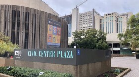 A Civic Center Plaza structure and sign is in front of the theater and Golden Hall, March 21, 2023.