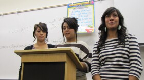 Students make an announcement at a weekly Hispanic Student Union meeting.