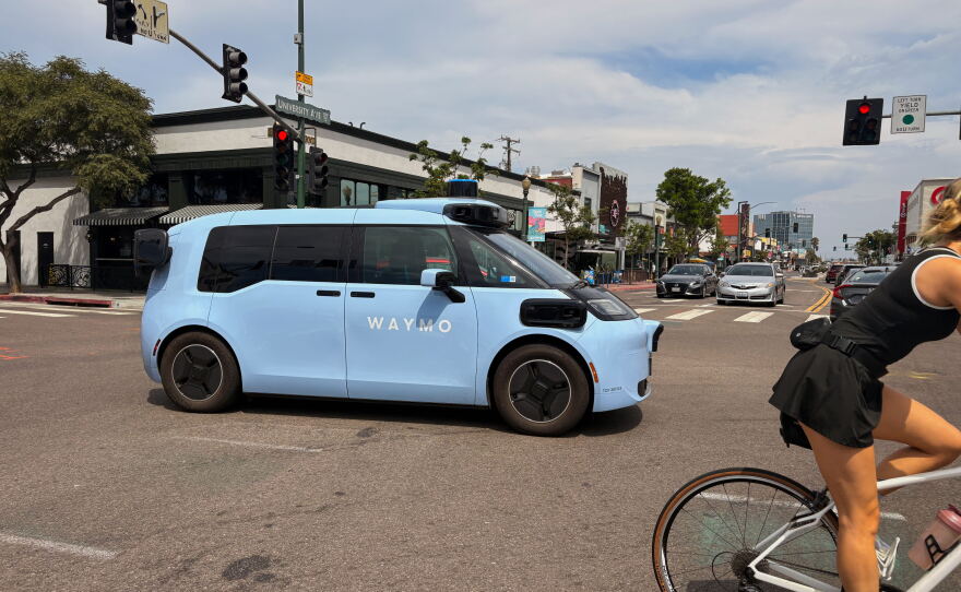 A Waymo driverless car crosses the intersection of 30th and University Avenues in North Park on Aug. 20, 2026.