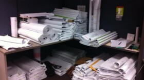 Building plans wait to be reviewed as they make their way through the permitting process. 