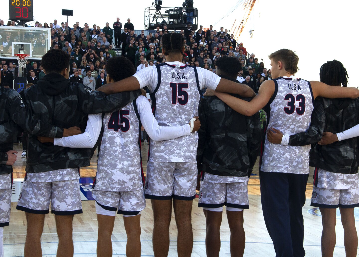 The Gonzaga team lines up court-side before the Armed Forces Classic begins aboard the USS Abraham Lincoln in San Diego on Nov. 11, 2022.