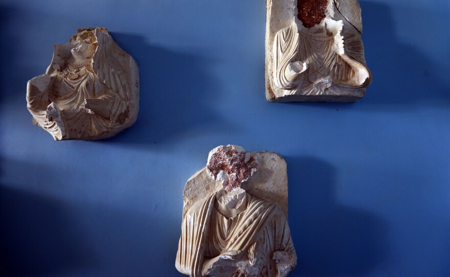 Beheaded and mutilated statues are seen in the destroyed museum in the ancient Syrian city of Palmyra on Thursday. Syrian troops backed by Russian forces recaptured Palmyra on March 27, 2016.