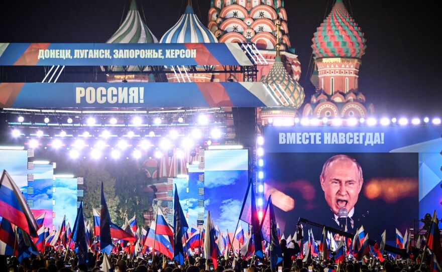 Russian President Vladimir Putin is seen on a screen set at Red Square in Moscow on Sept. 30, as he addresses a rally marking the annexation of four regions of Ukraine occupied by Russian troops: Lugansk, Donetsk, Kherson and Zaporizhzhia.