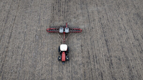 In this aerial view, Dan Duffy uses a tractor to plant soybeans on land he farms with his brother on April 28, 2025 near Dwight, Illinois.