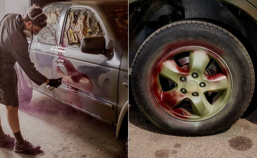 Left: A painter adds dark red spots to a truck to camouflage with the reddish dirt and mud often found in Ukraine’s east and south. Right: A detail of a wheel of a newly painted truck.