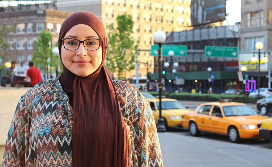 Jessica Abdelnabbi Berrocal stands in Journal Square in Jersey City. She's a Latina who was raised Roman Catholic, but is a recent convert to Islam. Her mom's background is Sephardic Jew. "This is what it is," she says. "I am what you see in America right now."