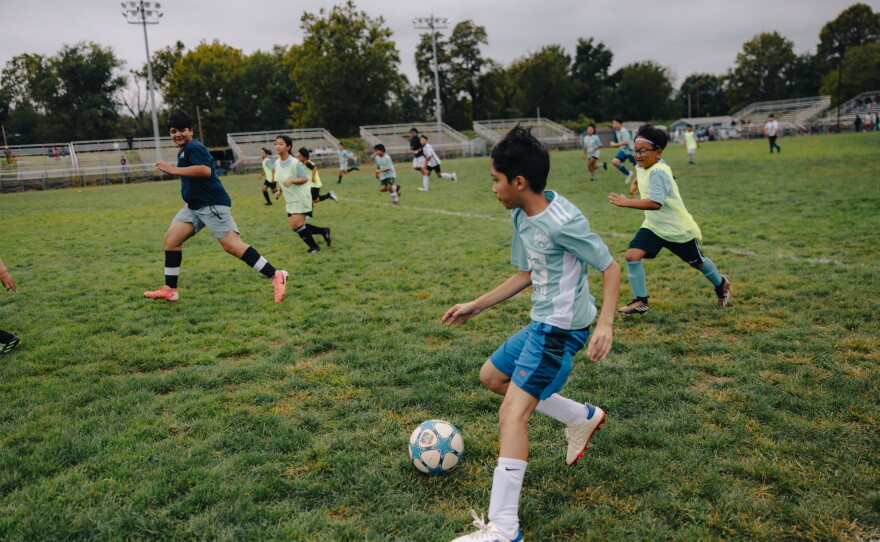 Children from ARU's Soccer for Success program play in a scrimmage during the Kalu Singh Tamang Memorial Championship in Harrisburg, Pa., on Sept. 21, 2025.