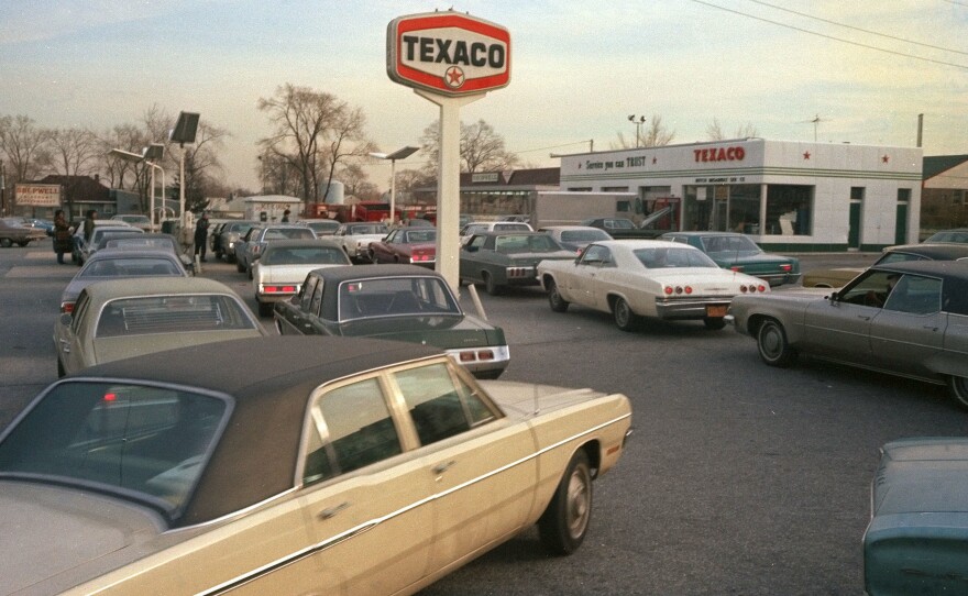 Motorists line up at a gas station on New York's Long Island, hoping to fill their tanks during the gasoline shortage of 1973-74. Long lines and fuel restrictions were common across the country.