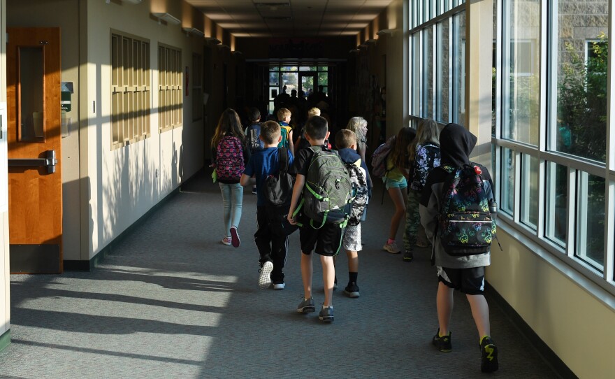 Students head to class in Thornton, Colo., this month. Infectious disease experts say the decline in vaccination rates against childhood diseases during the pandemic has increased the potential for outbreaks of diseases that were once largely vanquished in the U.S.