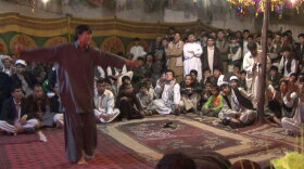 An illegal "Dancing Boy" party in Takhar, northern Afghanistan. The boy, Abdullah, 13, is "owned" by a local businessman.