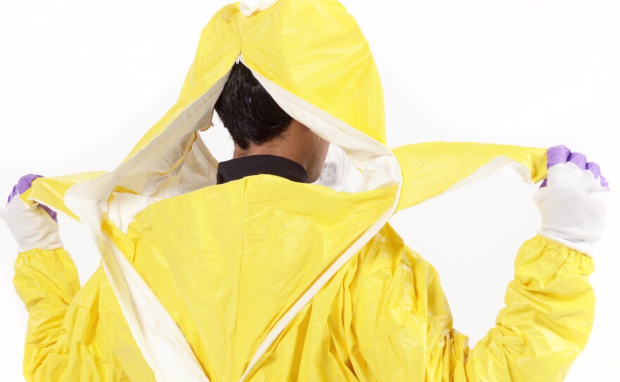 The prototype has zippers on the rear, which is less likely to come into contact with infectious fluids than the front of the suit.