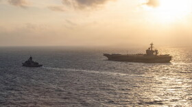 Royal Australian Navy frigate HMAS Perth sails alongside the aircraft carrier USS George Washington in the South China Sea, Aug. 11, 2026.