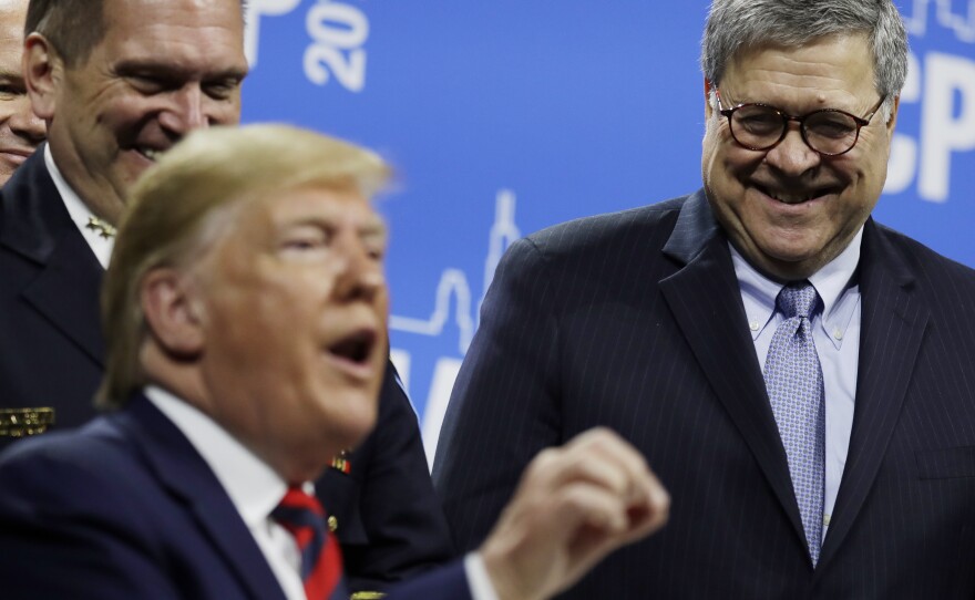 Attorney General William Barr with President Trump at the International Association of Chief of Police conference on Oct. 28. The men have a better relationship than Trump did with Jeff Sessions.