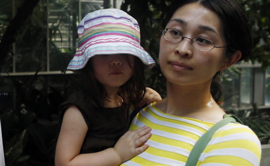 "It's a very strange evolutionary strategy to invest 10 years to make a flower that only last one or two days," says Alice Chen, a plant biologist who works at a law firm in Washington. She went to see the corpse flower with her daughter Adie.