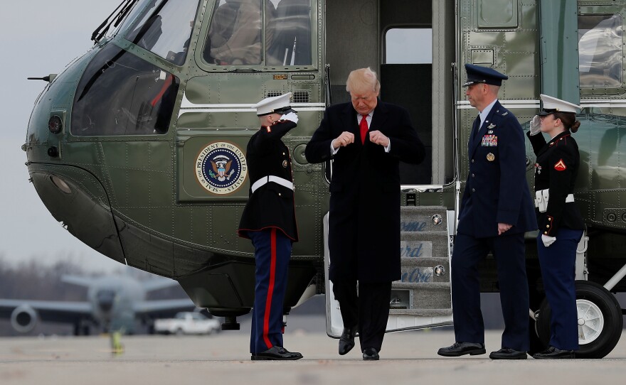 President Trump arrives to board Air Force One at Joint Base Andrews in Maryland on Dec. 22. Openly transgender people will be allowed to enlist in the military starting Monday after the White House decided not to appeal.