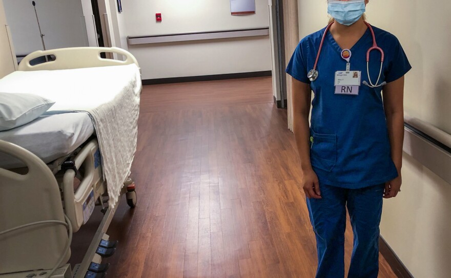 Mary Venus, a nurse from the Philippines, on duty at Billings Clinic in Billings, Mont.