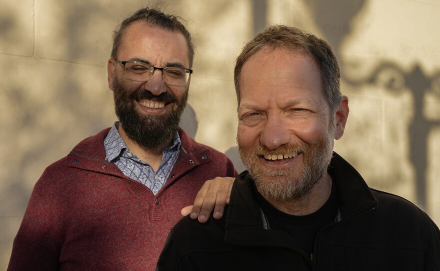 Aziz Abu Sarah (left) and Maoz Inon in Jaffa, Israel, in January. Their new book, The Future Is Peace: A Shared Journey Across the Holy Land, documents their peace activism that emerged from trauma and loss. Abu Sarah's brother died from injuries inflicted in Israeli custody and Inon's parents were killed by Hamas-led militants on Oct. 7, 2023.