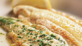 Sole à la meunière: Martha demonstrates how to dredge fish in flour and the importance of cooking over high heat to achieve a perfect, golden-brown finish.
