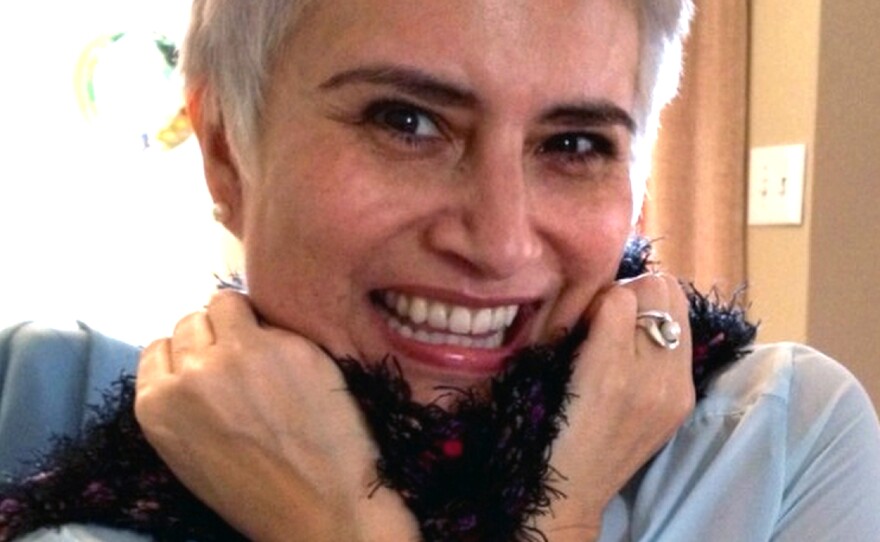 Serros, pictured here in February 2014, got her big break as a college student in 1993.