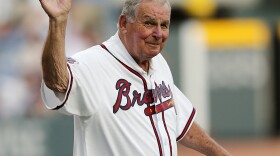Former Atlanta Braves manager Bobby Cox waves to the crowd as he is introduced at a ceremony to open the Braves' new stadium before a baseball game against the San Diego Padres, April 14, 2017, in Atlanta.