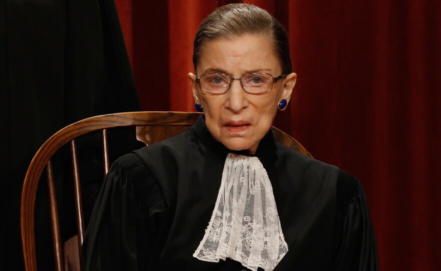 U.S. Supreme Court Justice Ruth Bader Ginsburg, shown wearing one of her trademark collars in 2010, now has an insect named in her honor.