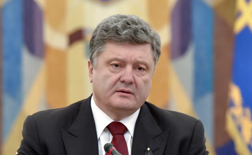 Ukraine's president Petro Poroshenko speaks at a meeting of the National Security and Defense Council (NSDC) of Ukraine on Sunday.