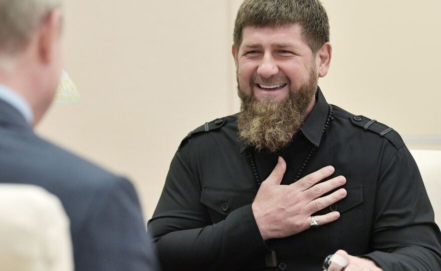 The head of the Chechen Republic, Ramzan Kadyrov, speaks with Russian President Vladimir Putinin 2019.
