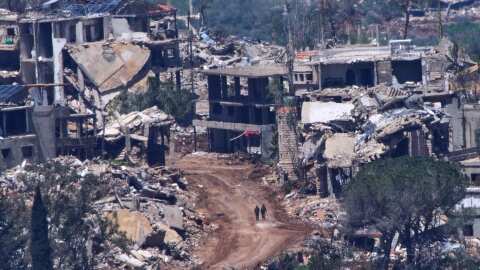 Two Israeli soldiers operate in southern Lebanon, as seen from northern Israel, April 29, 2026