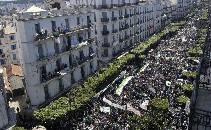 Algerians march during a protest in Algiers, Algeria, on Friday.