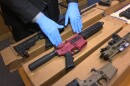 FILE - "Ghost guns" are on display at the headquarters of the San Francisco Police Department in San Francisco, Nov. 27, 2019. California state lawmakers advanced a measure Tuesday, April 19, 2022, that would make it easier to skirt a federal law in order to sue gunmakers, legislation that opponents say is ultimately aimed at driving manufacturers out of business.