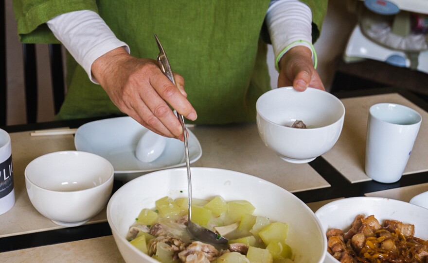 Dr. Marilyn Wong serves green papaya and pigs' feet soup, a Vietnamese dish believed to fortify new mothers.