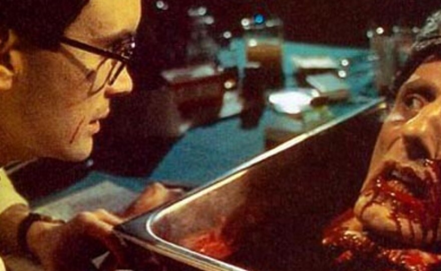 Herbert West (Jeffrey Combs) has a good head on his shoulders and another on his desk in Stuart Gordon's cult classic, "Re-Animator," the Day 22 pick in a month of streaming horror.