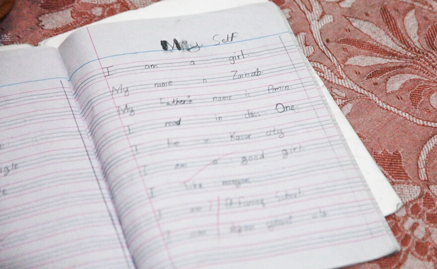Zainab's last entry in her English class notebook reads, in part: "My name is Zainab ... I live in Kasur city. I am a good girl."