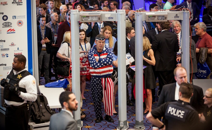 Attendees work their way through a Secret Service-mandated security check ahead of vice-president Mike Pence's arrival on the second day of the conference.